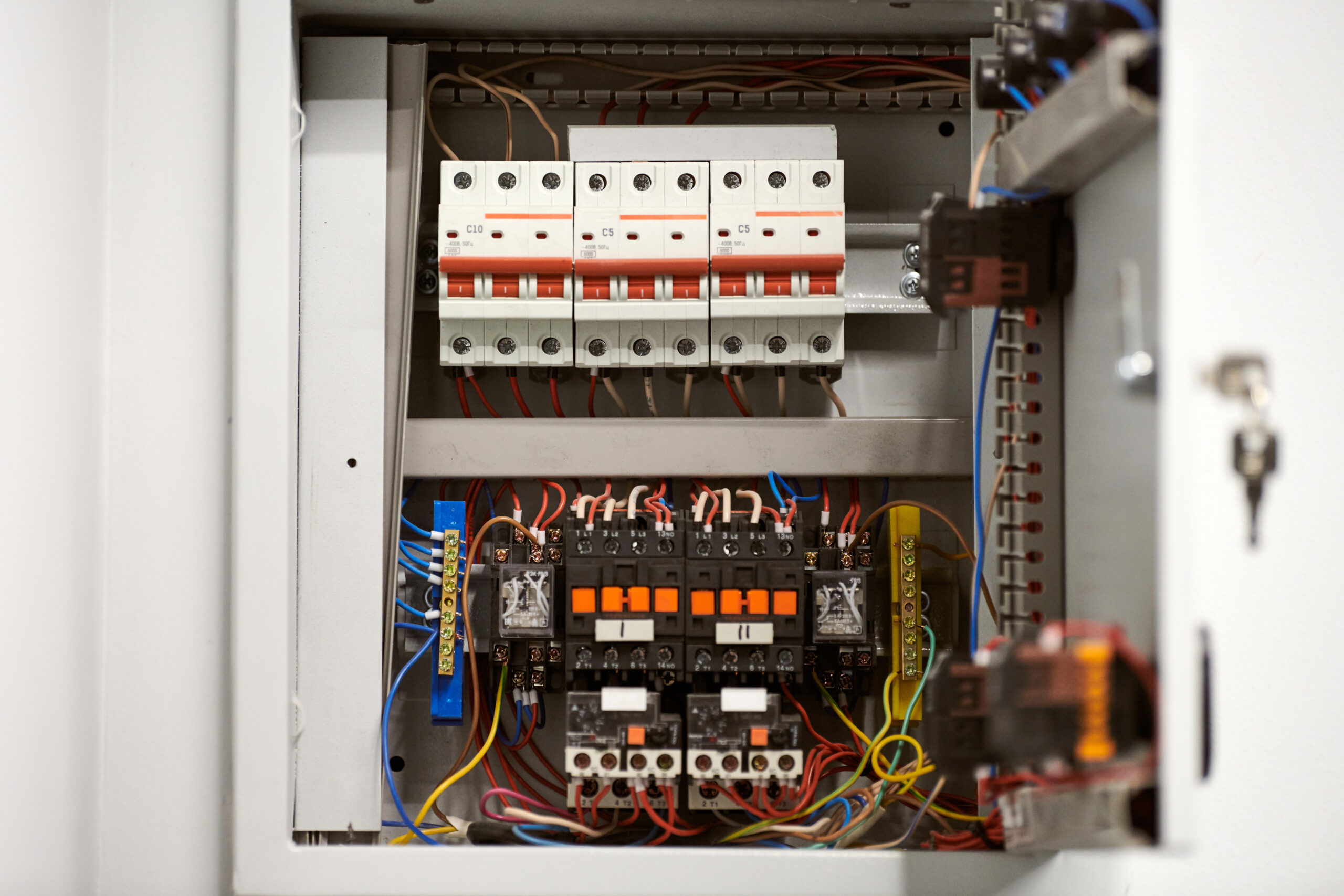 Circuit breaker in switch box. Control voltage switchboard. Distribution board for control electrical voltage in house or office.